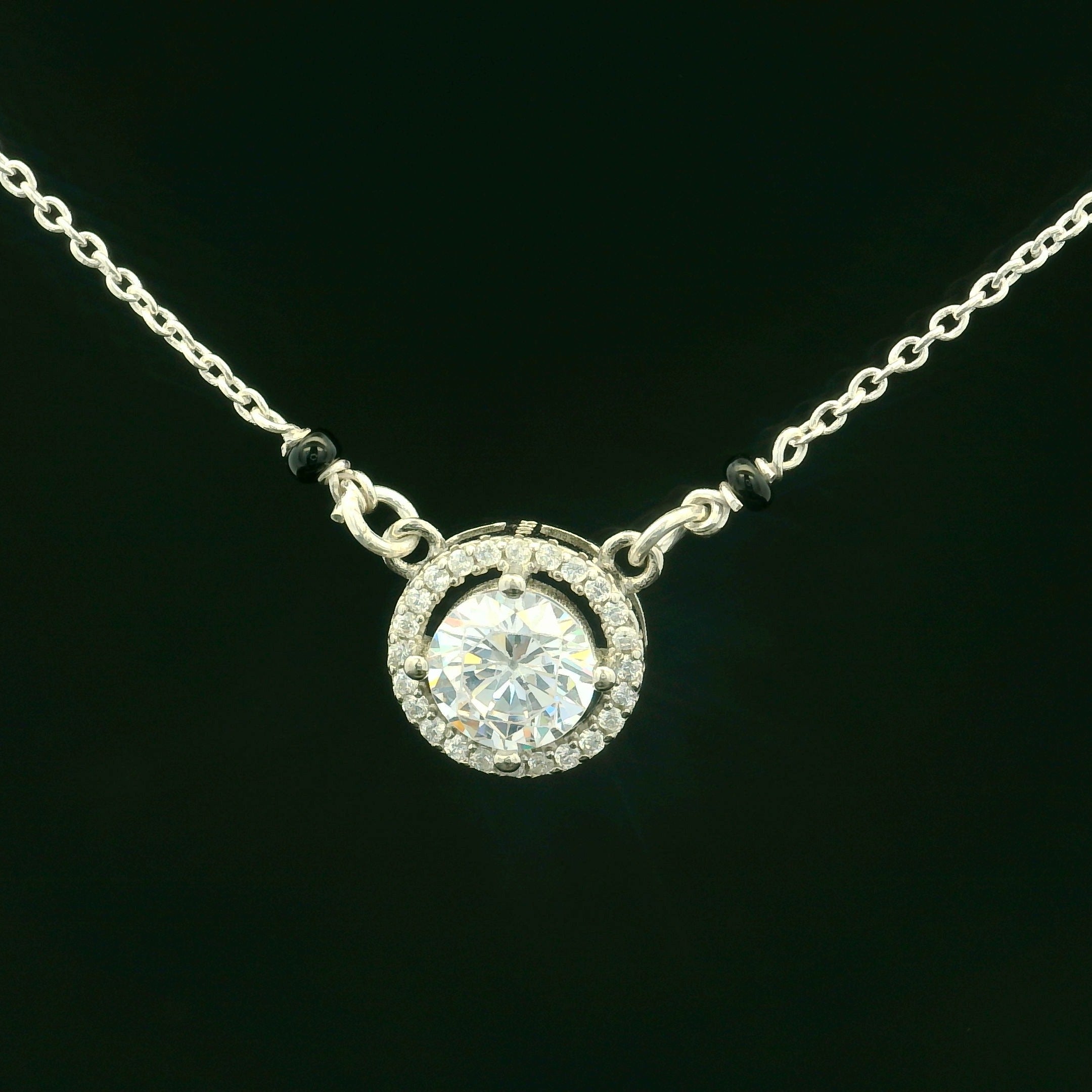 Elegant Silver Pendant with Sparkling Gemstone - Silvenca