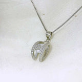 Elegant Silver Pendant with Sparkling Gem - Silvenca