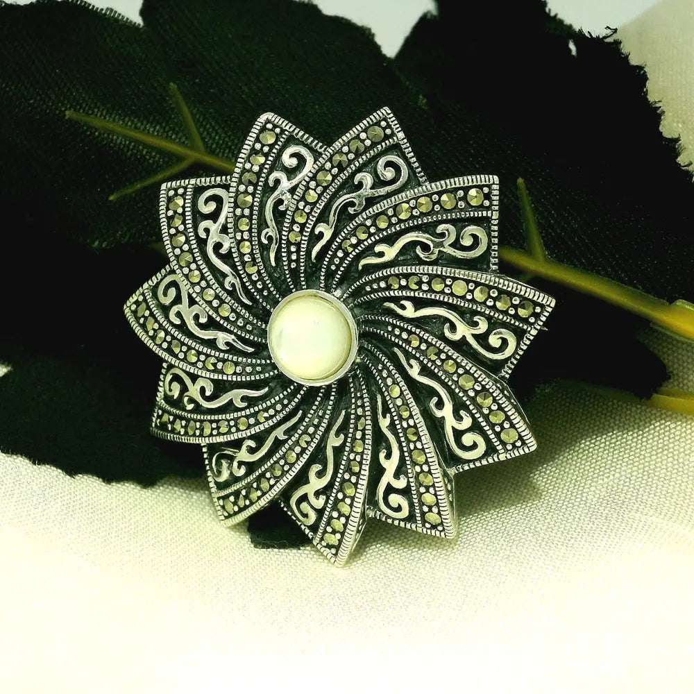 Elegant Silver Floral Brooch - Silvenca